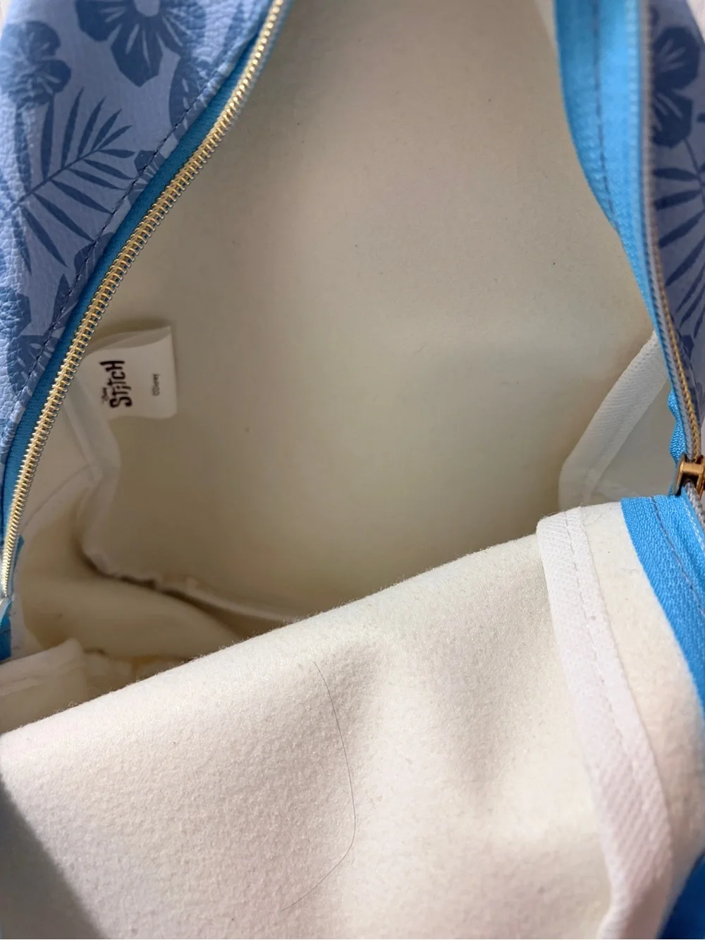 Disney Light Blue Stitch Mini Backpack with Gold Zipper Accents